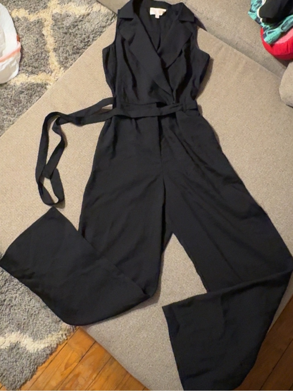 Sleeveless Black Wrap Jumpsuit with Notched Collar and Waist Tie